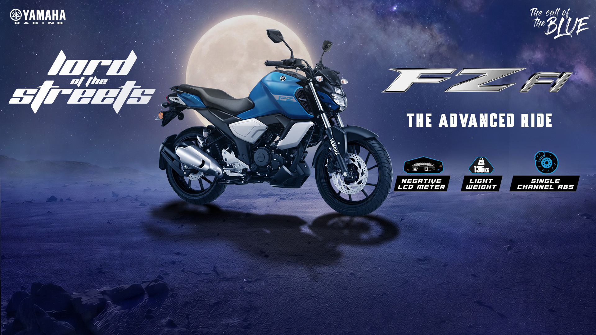 Yamaha FZ FI blue motorcycle stands under a moonlit sky with Lord of the Streets branding, The Advanced Ride text, and Yamaha Racing logos.